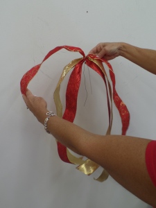 Another Show Me Decorating key ingredient is used, Ribbon! Cuts lengths of each ribbon (approx.1yd) and place a wire in about the middle leaving one side a little longer.