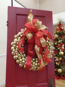 Wire on a red and gold bow to a Gold ball wreath or choose your own color combination!